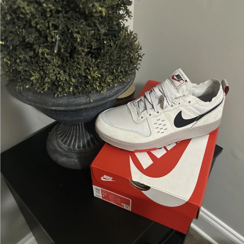 Nike Men's White Sneakers with Black Swoosh